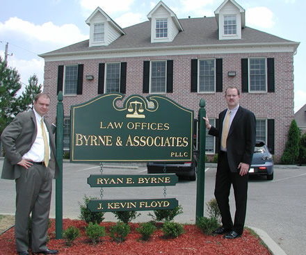 Kevin Floyd and Ryan Byrne in front of the Law Offices of Byrne & Associates